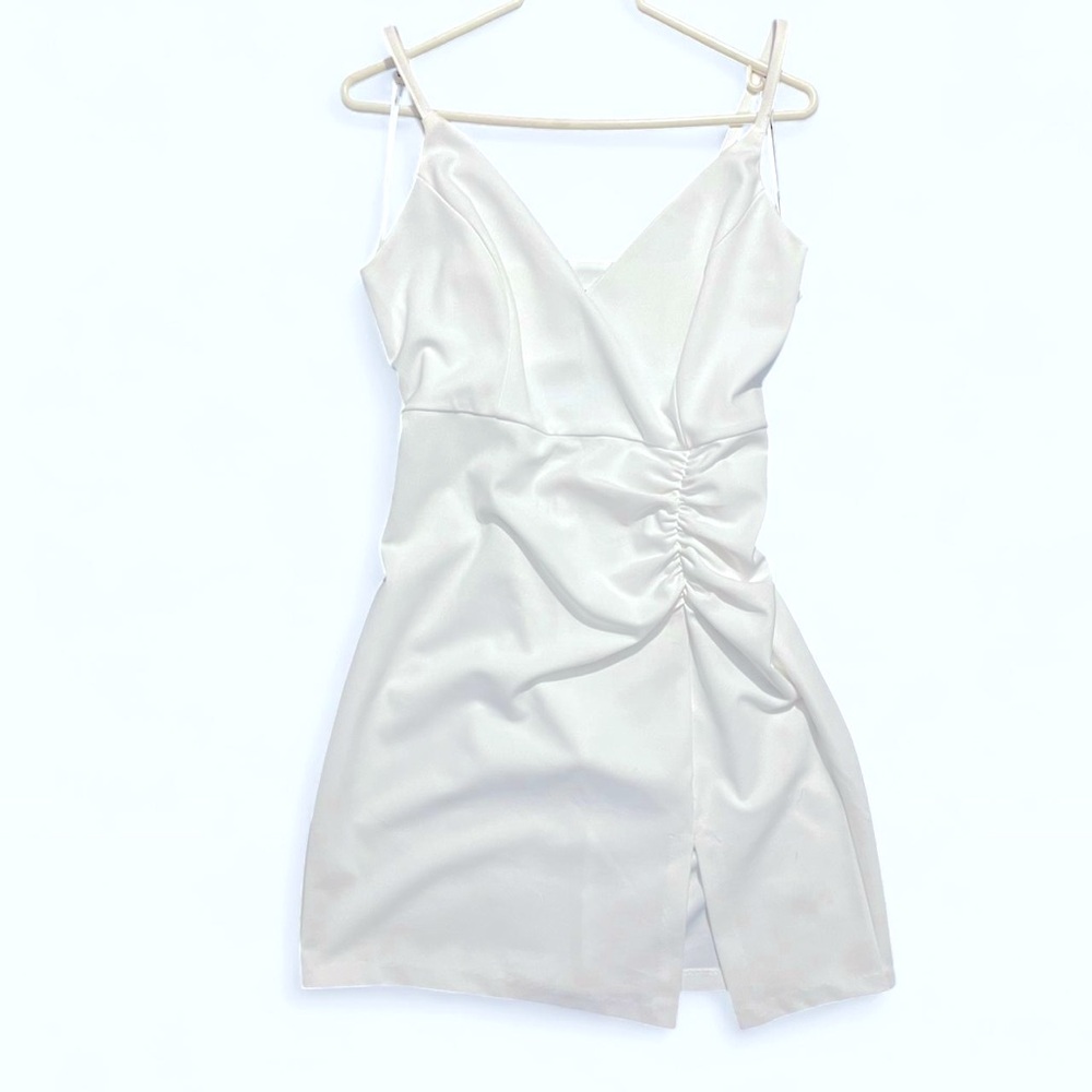 White mini dress with spaghetti straps